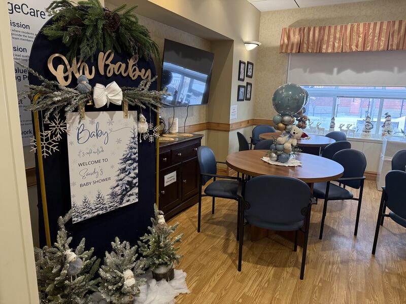 Blue balloon arch for baby shower celebration