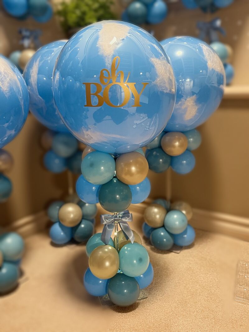 Oh Boy themed baby shower balloon décor in blue and gold