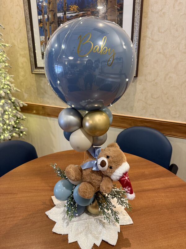 Teddy bear themed baby shower with pastel balloon garland