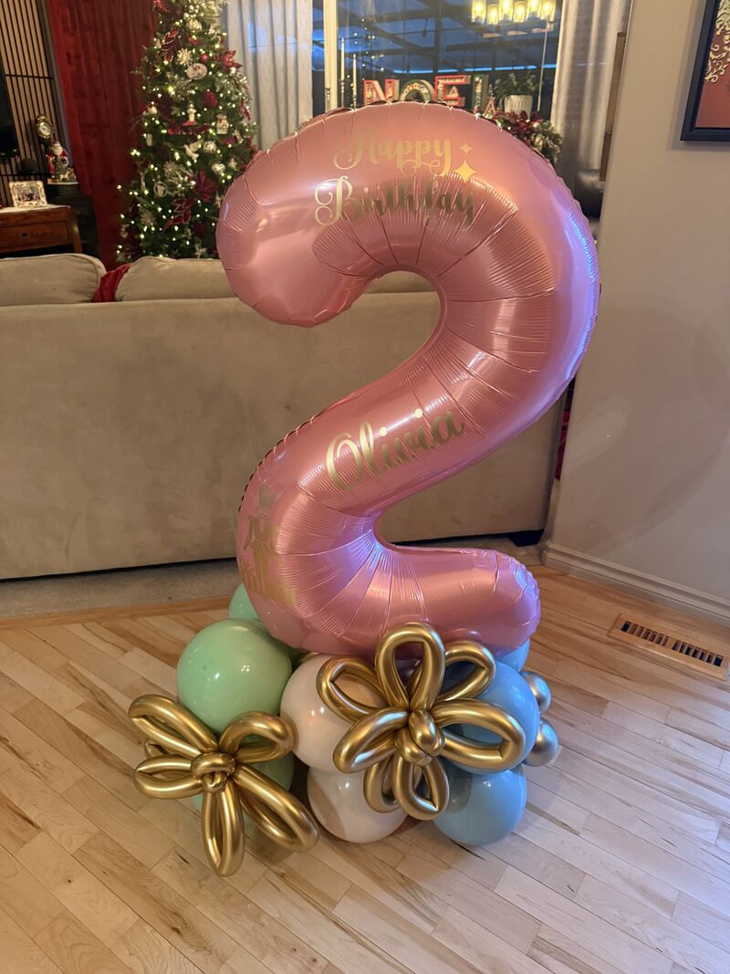 Pink balloon décor for second birthday party