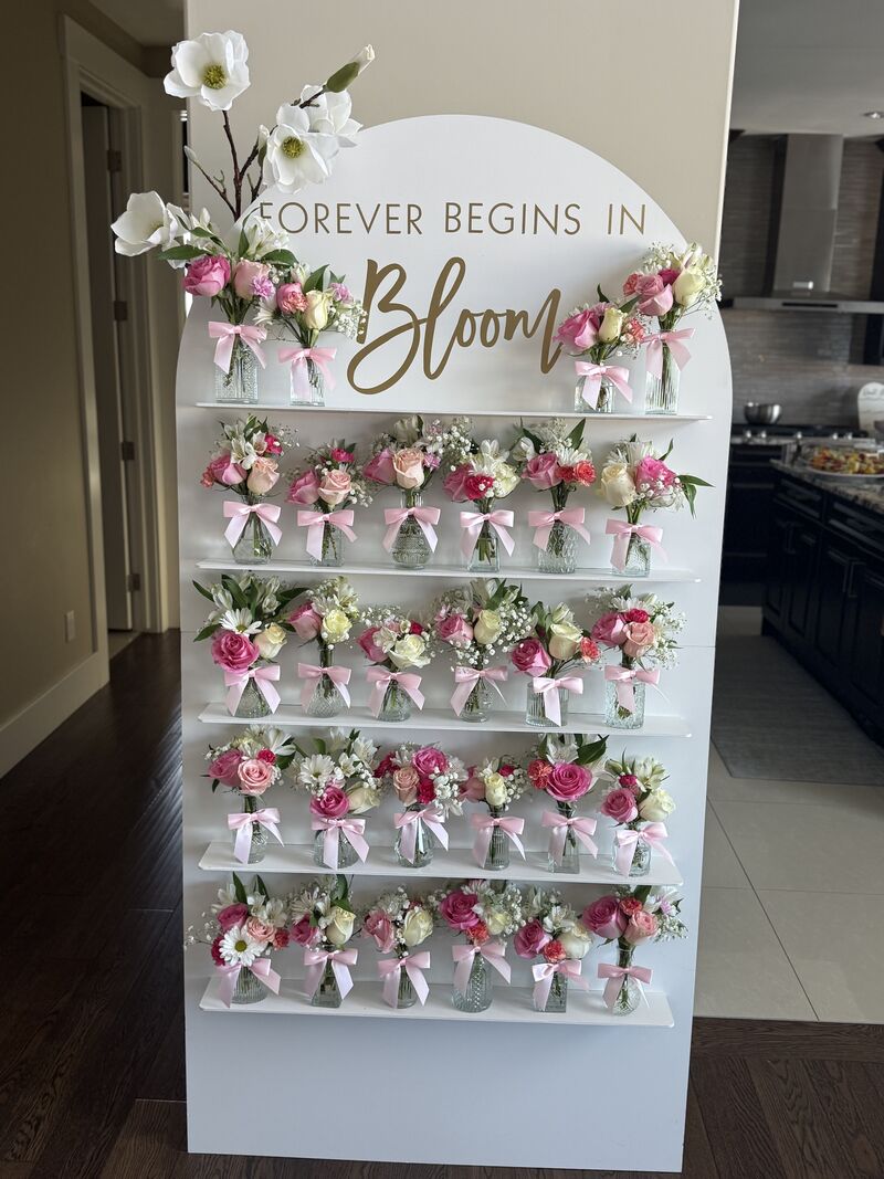 Stunning bloom wall and balloon installation at Edmonton wedding